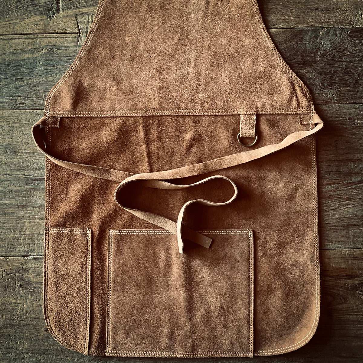 PECHERA ASADOR CUERO RENO